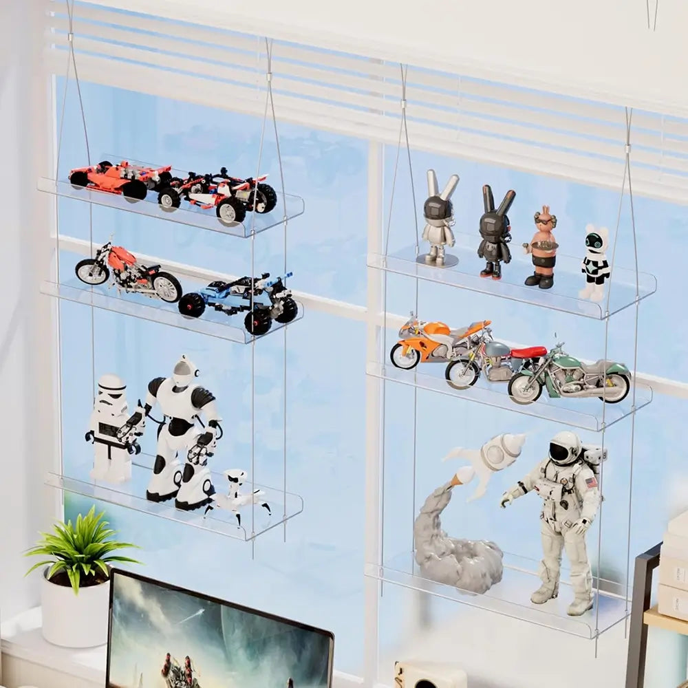 Clear acrylic shelves displaying various models against a light blue wall.