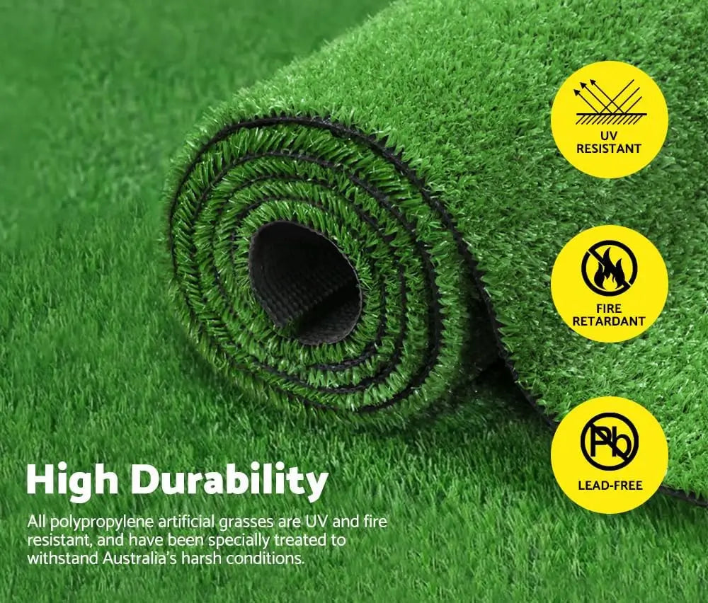 Roll of green artificial grass with durability features highlighted on a green background