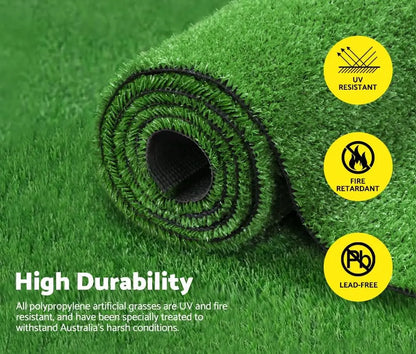 Roll of green artificial grass with durability features highlighted on a green background