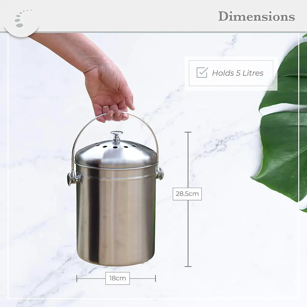 Stainless steel compost bin with dimensions on a marble background