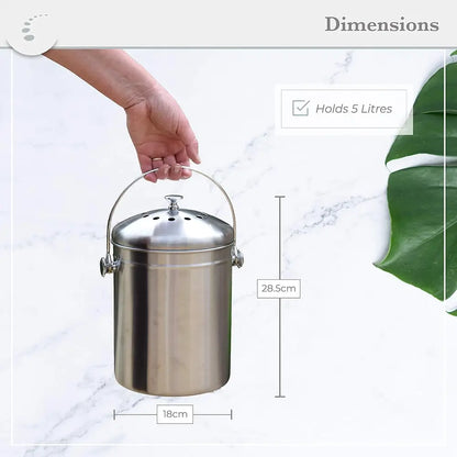 Stainless steel compost bin with dimensions on a marble background