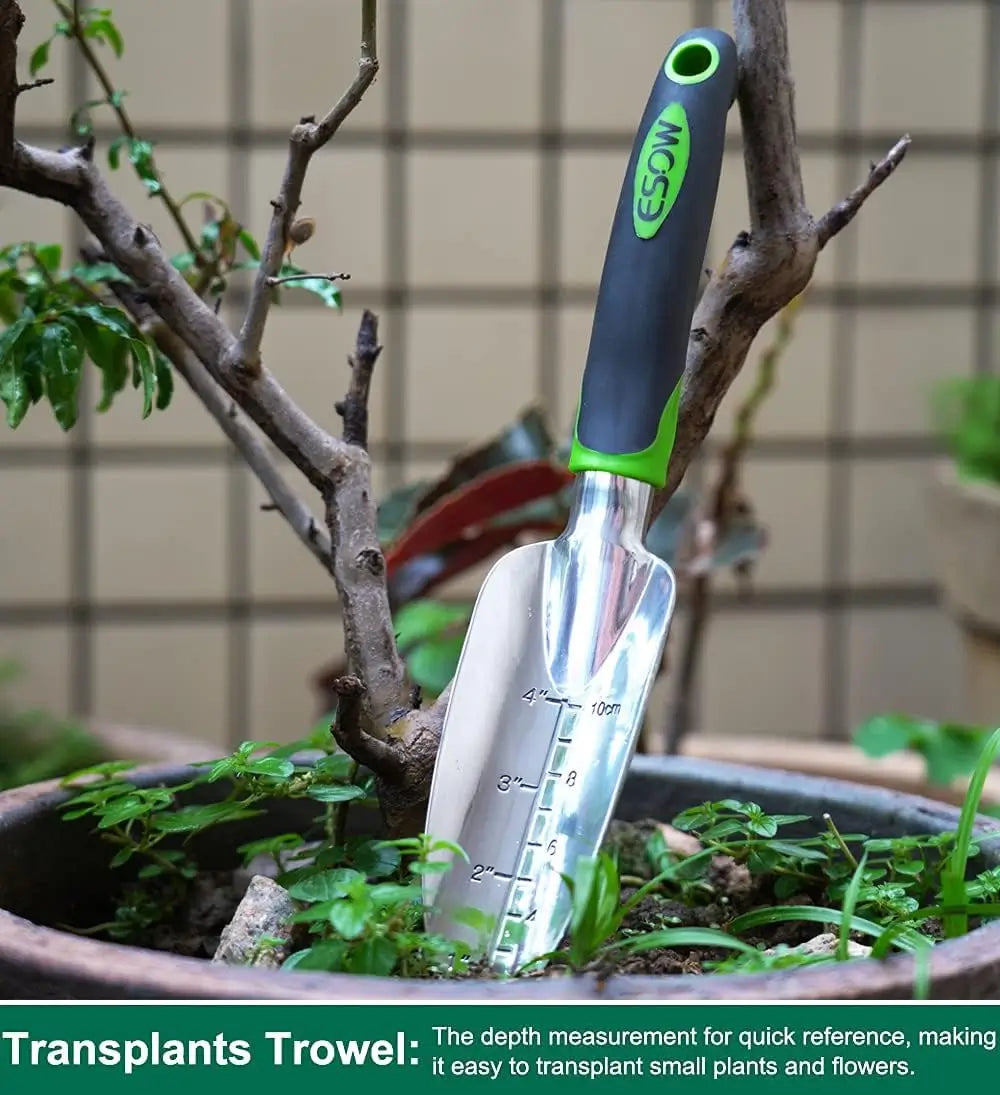 Transplanting trowel with depth measurement in a pot of plants