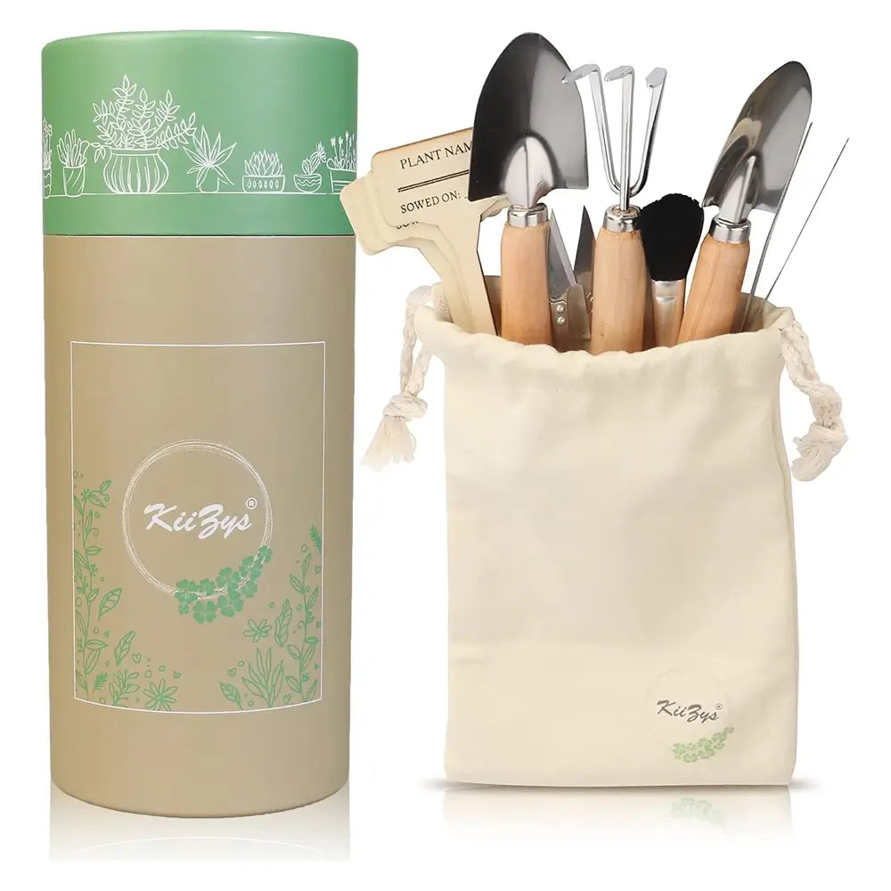 A gardening tool set displayed with its packaging, featuring a beige cylindrical storage container with a green lid, a cream drawstring pouch, and various hand tools with wooden handles.