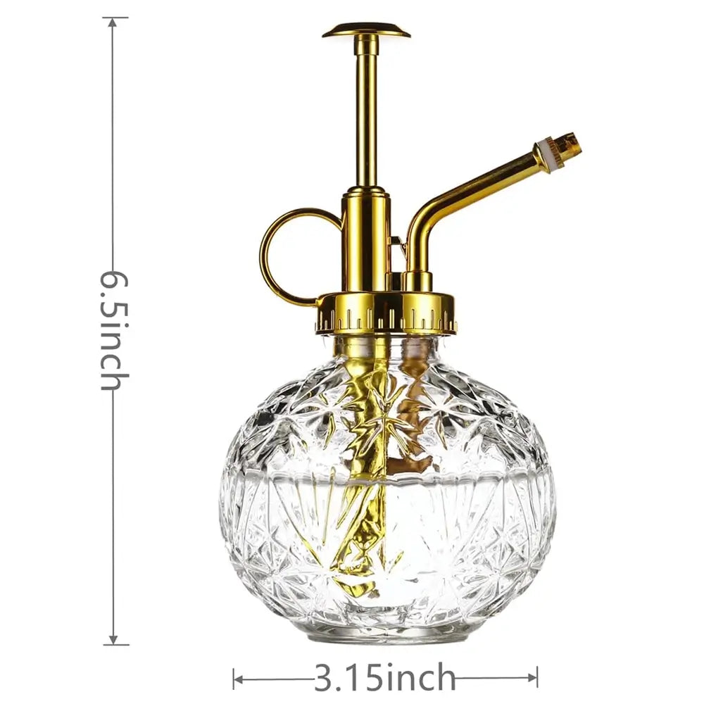 Glass and gold Mister Spray Bottle with measurements on a white background