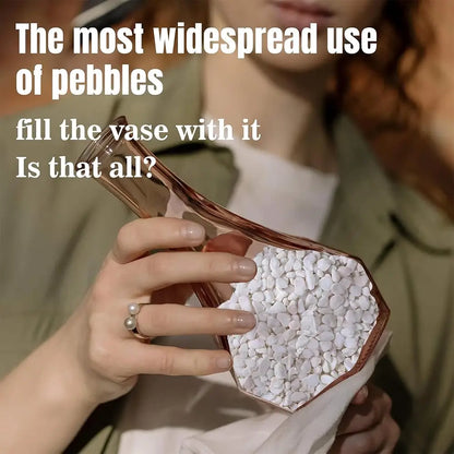 Person holding a vase filled with pebbles, with text overlay.