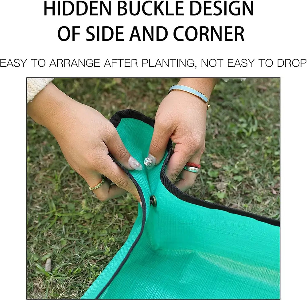 Person adjusting a green fabric with a hidden buckle design on a grassy background