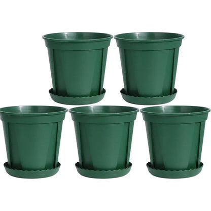 Set of 5 green plastic pots with saucers on a white background