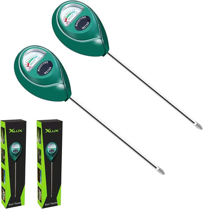 Two green soil moisture meters with long probes and their packaging on a white background.